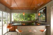 Clarke Residence building interior kitchen with orange stools